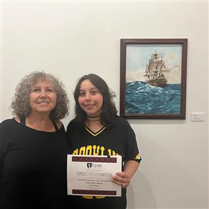 BAYA winner, Sarah Stair posing with art teacher, Debra Smith.